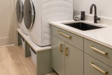 River Woodworking Clean Contemporary Slab Door Laundry Room Cabinetry 3